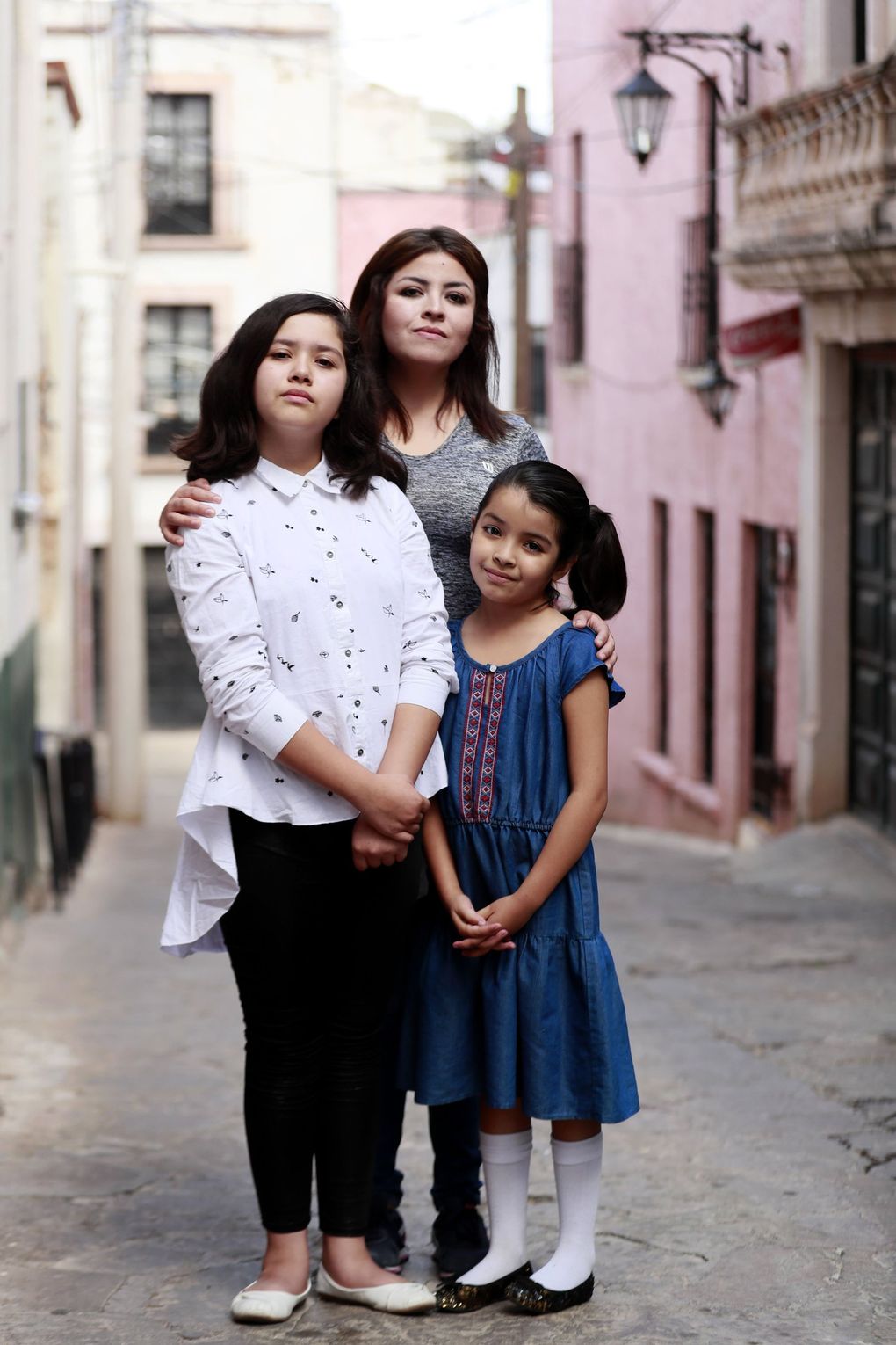 Evelyn Leyva Gómez says she found no help for her daughters Tori, 11, and Ellie, 9, as they tried to keep up in school after moving from the U.S. (Erika Schultz / The Seattle Times)