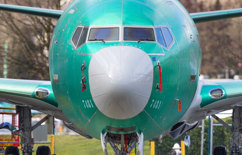 A Boeing 737 Max 8 sits behind the Boeing 737 Renton factory waiting for engines. The Angle of attack (AOA) instrument of the 737 MAX, is the bottom piece of equipment below just below the cockpit windshield. 

Photographed on March 13, 2019 209611 209611