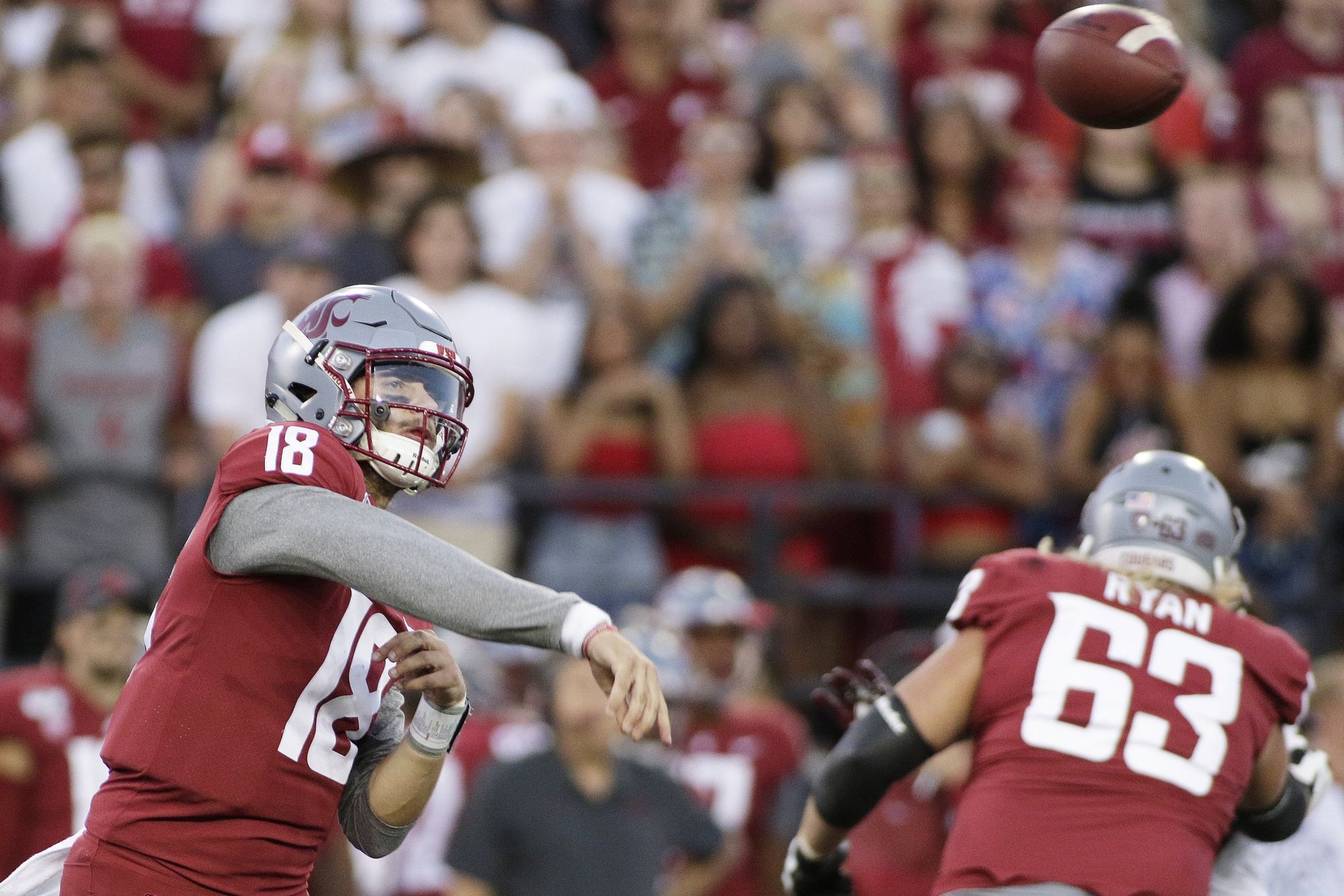 Anthony Gordon of the Washington State Cougars looks to throw the  Washington  state football, College football uniforms, Washington state cougars