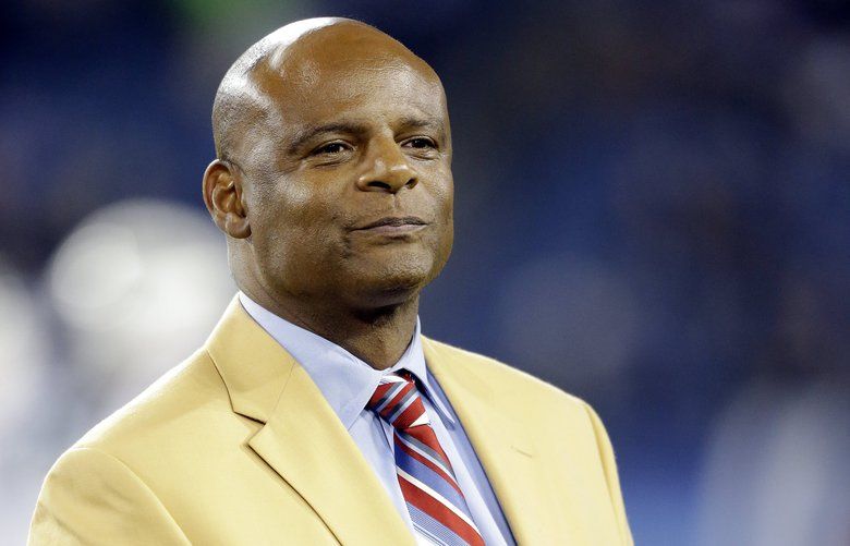 Former Houston Oilers quarterback and Hall of Fame member Warren Moon takes part in a ceremony honoring the Tennessee Titans/Houston Oilers Hall of Fame players at halftime of an NFL football game between the Titans and the New York Jets on Tuesday, Dec. 18, 2012, in Nashville, Tenn. (AP Photo/Wade Payne) OTK