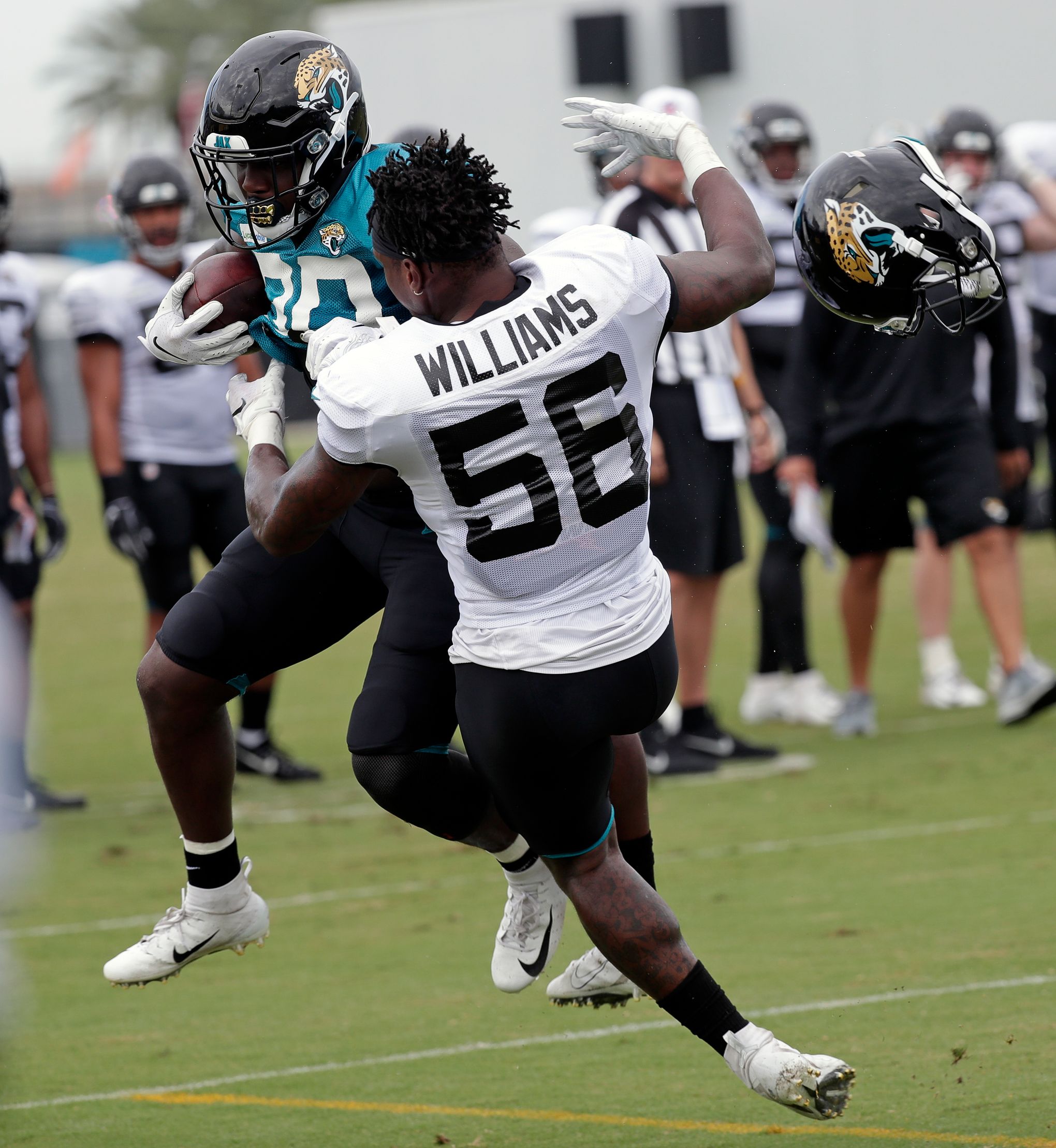 New York Jets linebacker Quincy Williams (56) runs against the New