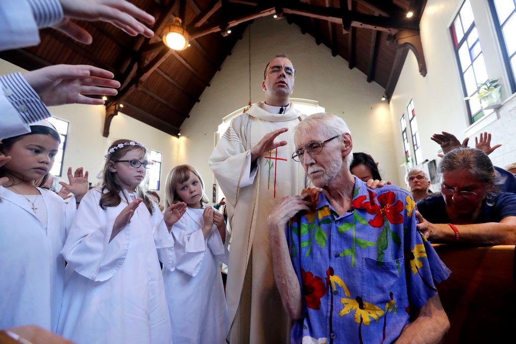 Robert Fuller returned more often to St. Therese Parish Catholic church in Seattle in the time before he ended his own life. The Roman Catholic Church opposes aid-in-dying laws like Washington’s, but St. Therese Parish is known for accommodating a range of beliefs. (AP Photo/Elaine Thompson)