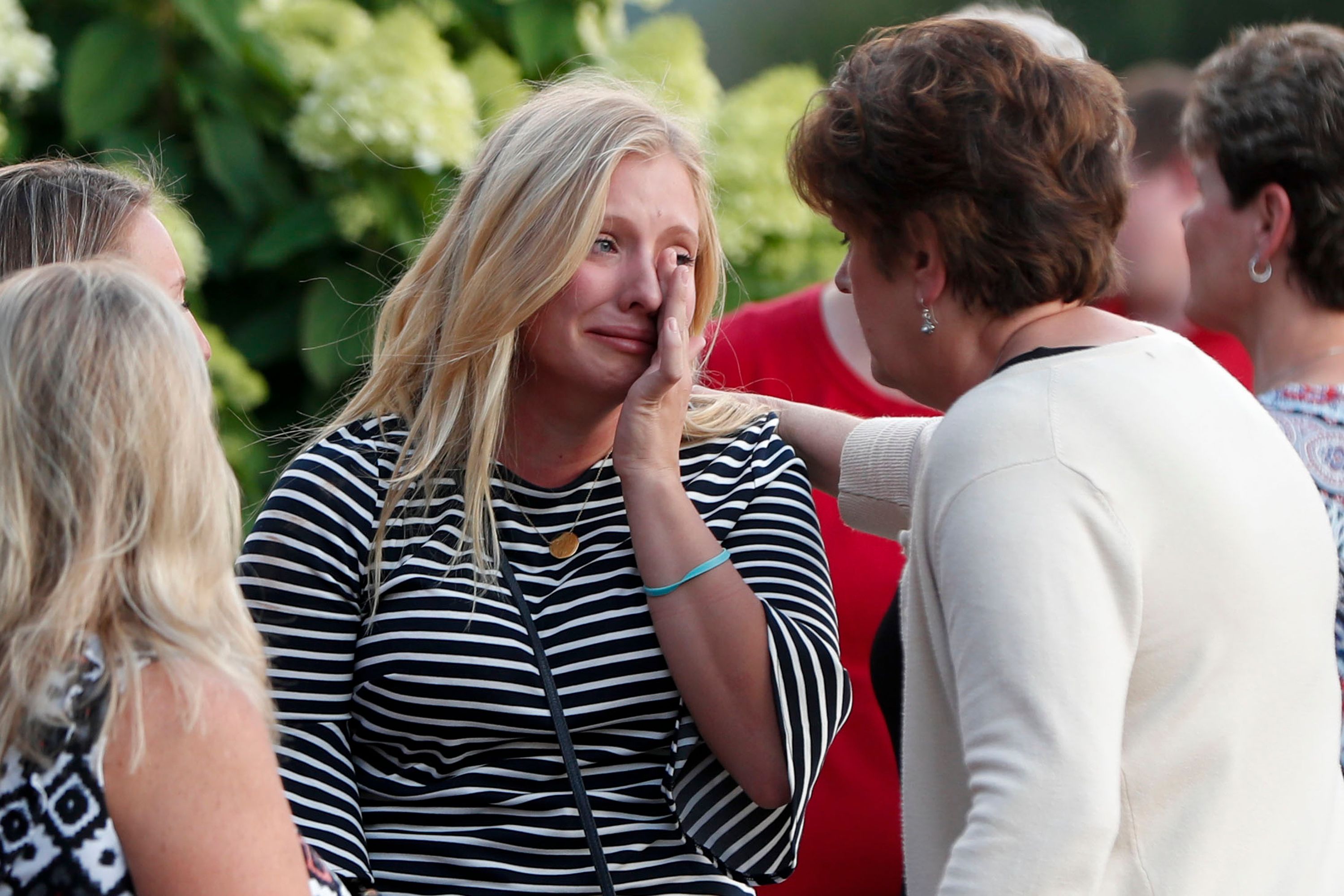 Loved ones mourn shooting victims as policy debate rages The