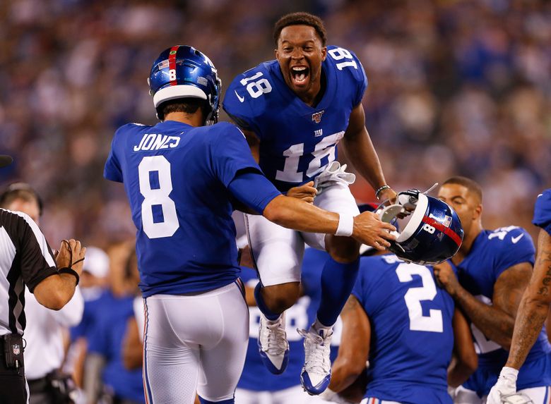 Manning and Jones throw TDs to lead Giants over Bears