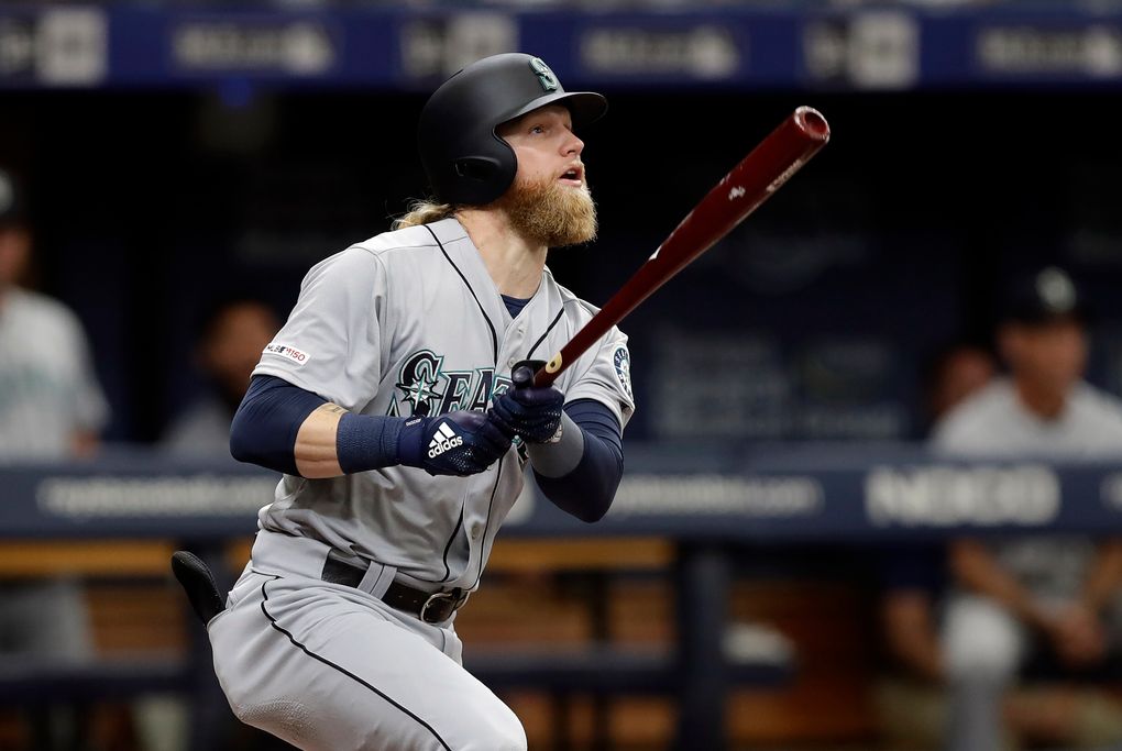 Jake Fraley flies out to Tampa Bay Rays right fielder Guillermo Heredia during his major-league debut Aug. 21 in St. Petersburg, Florida. (AP Photo/Chris O’Meara)