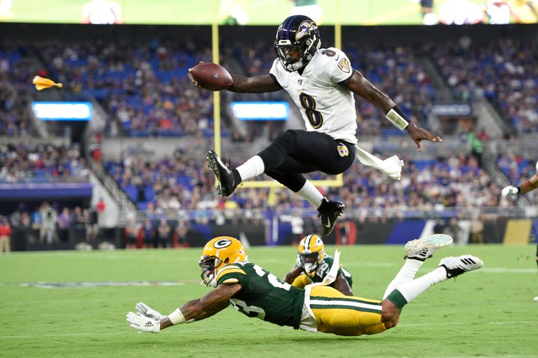 Jackson looks sharp, Rodgers sits as Ravens beat Packers