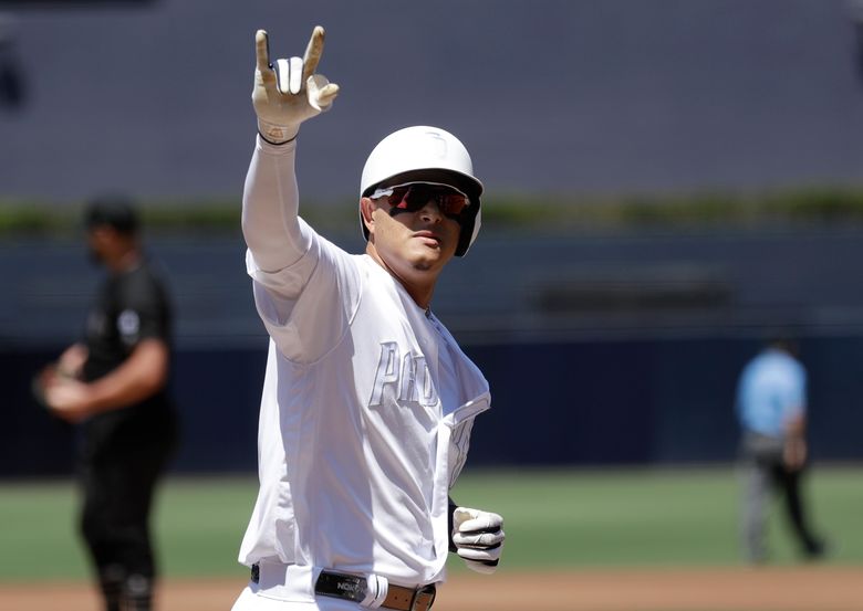 San Diego Padres' Eric Hosmer reacts after hitting a two-run home