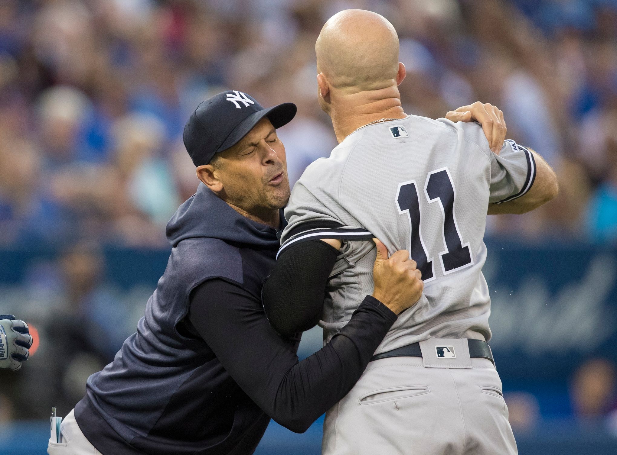 Yankees OF Brett Gardner restrained from going after umpire