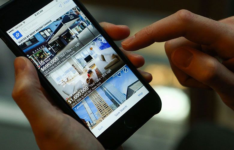 Zillow shares fall after forecasting homeflipping losses The Seattle