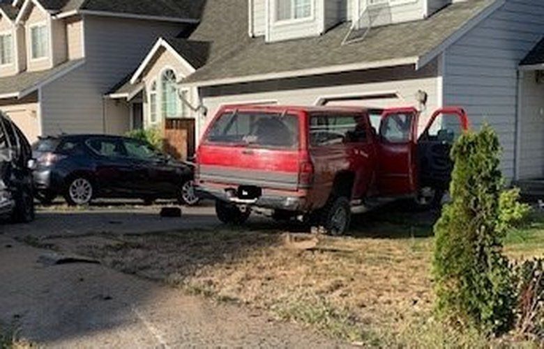 Driver Crashes Car Into Renton Home After Fleeing Police Say The Seattle Times 
