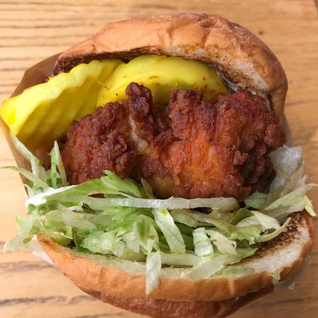 The umami bomb that is the Ma’ono chicken-breast sandwich is served on a sweet bun with daikon pickles, iceberg lettuce and Kewpie mayo. (Tan Vinh / The Seattle Times)