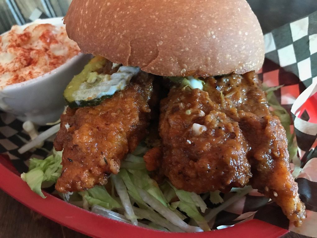 The Nashville hot chicken sammie at Sisters and Brothers in Georgetown is the most fiery take on our top-10 chicken-sandwich list. (Tan Vinh / The Seattle Times)