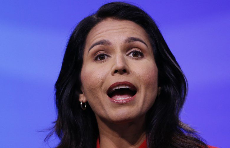Democratic presidential candidate U.S. Rep. Tulsi Gabbard, D-Hawaii, speaks during the New Hampshire state Democratic Party convention, Saturday, Sept. 7, 2019, in Manchester, NH. (AP Photo/Robert F. Bukaty) NHRB164 NHRB164