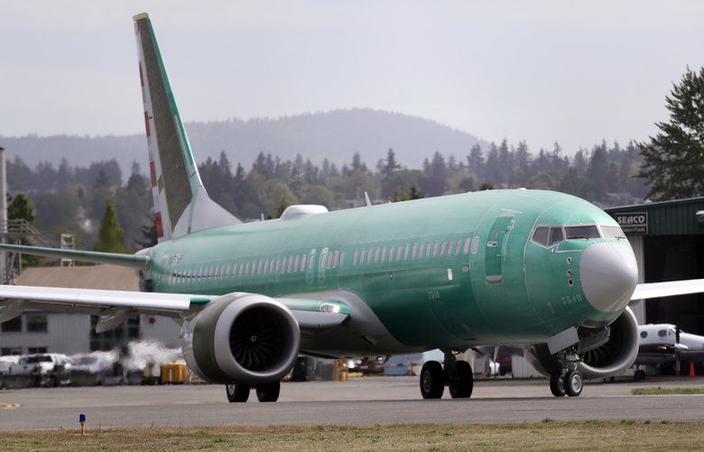 FILE – In this May 8, 2019, file photo a Boeing 737 MAX 8, being built for American Airlines, makes a turn on the runway as it’s readied for takeoff on a test flight in Renton, Wash. American Airlines says it is delaying the expected return date for its Boeing 737 Max jets. The airline said Sunday, Sept. 1, that while it â€œremains confidentâ€ that coming software updates and training will mean recertification of the aircraft this year, it is extending cancellations for Max flights through Dec. 3. (AP Photo/Elaine Thompson, File) NYJK702 NYJK702