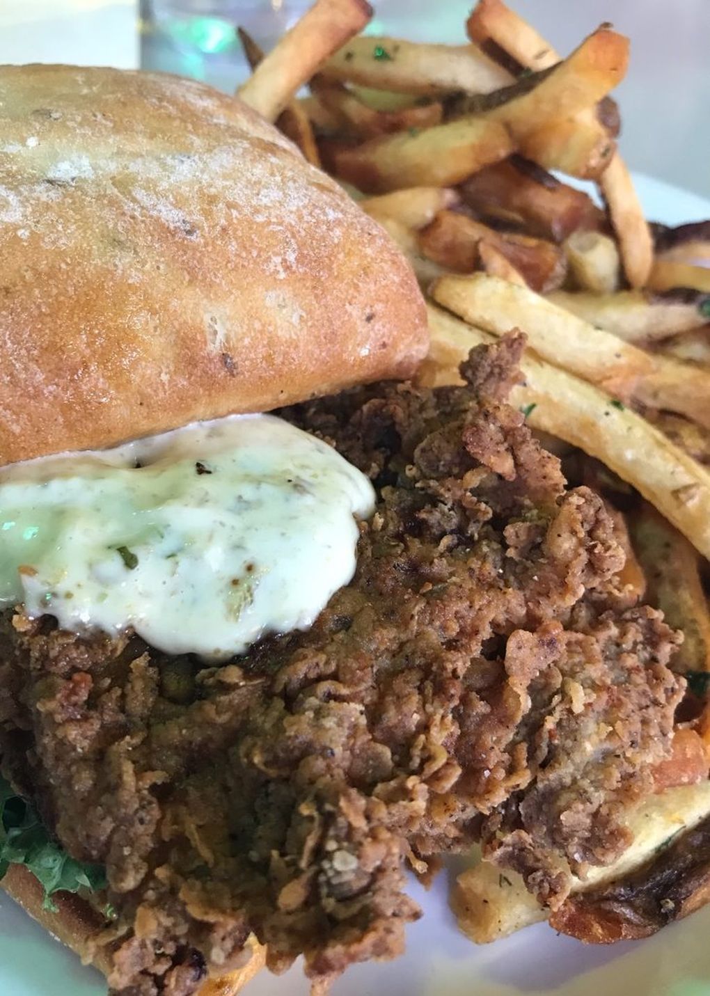 Skillet dishes the most aromatic chicken sammie, with the thigh meat getting a 48-hour fennel brine. It’s then coated in a fennel-seed-crusted batter along with other herbs for a tangy, slightly licorice bite. (Tan Vinh / The Seattle Times)