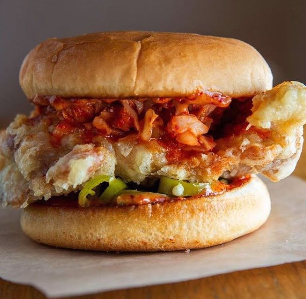 Bok a Bok injects its spicy fried-chicken sandwich with a medley of house-blend hot sauce, red chili aioli, pickled serrano chilies and kimchi. (Courtesy of Suzi Pratt)