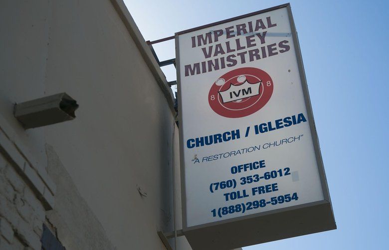 This is the headquarters of the Imperial Valley Ministries located in El Centro, Calif. It is housed in an old movie theater. U.S. Attorney Robert Brewer on Monday, September 10, 2019 announced the arrest of 12 people, leaders of the Imperial Valley Ministries, accusing them of subjecting 31 mostly homeless people to forced labor forcing them to surrender welfare benefits and making them panhandle for the financial benefit of church leaders.  (John Gibbins/The San Diego Union-Tribune via AP) CADIU102 CADIU102
