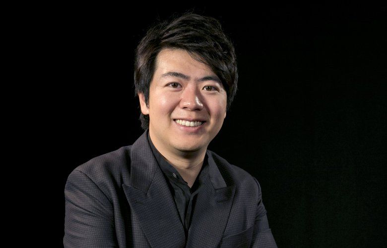 FILE – In this Oct. 21, 2015 file photo, Chinese concert pianist Lang Lang poses for a photograph in New York. The Chinese superstar has recorded a new cross-over album in which he tries to capture the spirit of New York, including doing a cover of “Empire State of Mind,†by Jay Z. (AP Photo/Kathy Willens, File) NYET217