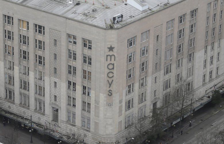 Macy’s Inc.’s department store in downtown Seattle is shown viewed from a neighboring building, Wednesday, Feb. 17, 2016. (AP Photo/Ted S. Warren)