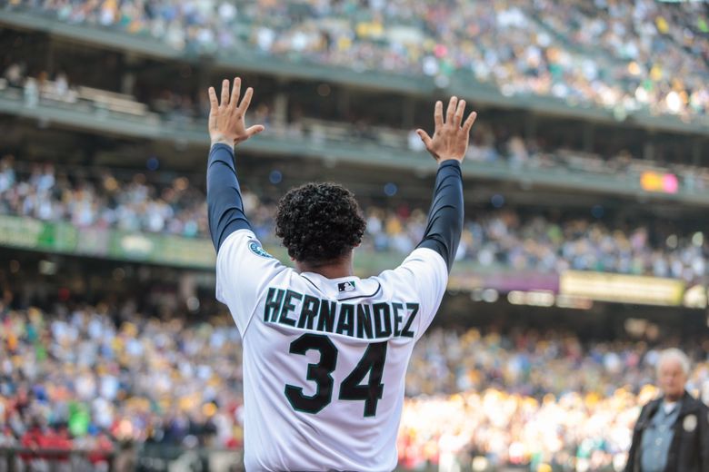 Felix Hernandez acknowledges the crowd in a 2014 game in which it became apparent the Mariners would not reach the postseason yet again.  (Dean Rutz / The Seattle Times)