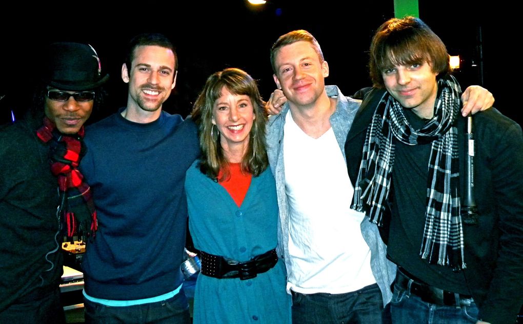 “Art Zone” host Nancy Guppy with Owuor Arunga, Ryan Lewis, Macklemore and Andrew Joslyn. (Sheila Mullen)