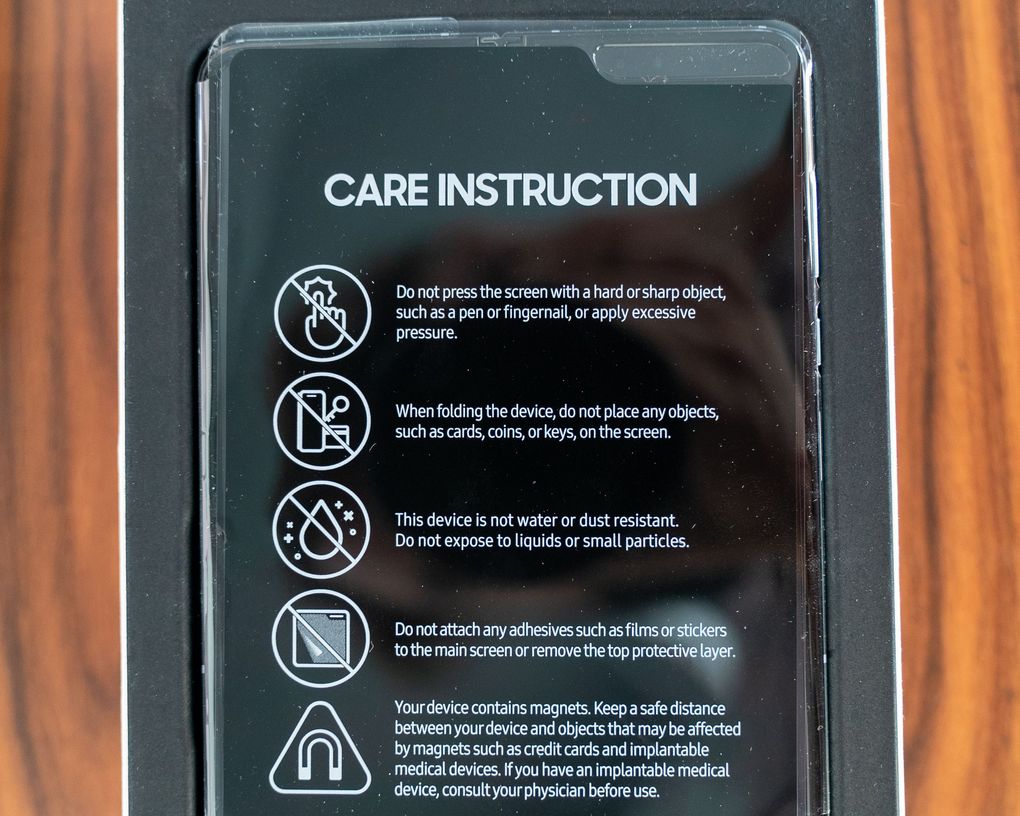 When you unbox Samsung’s Galaxy Fold, a sticker on the front of the phone lists many ways you might inadvertently damage it. (James Pace-Cornsilk / The Washington Post)