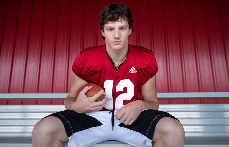 Mt. Si starting quarterback Clay Millen poses for a portrait after practice at Mt. Si High School, Seattle, on Sept. 23, 2019. Clay, a junior, comes from a family of quarterbacks. His older brother Cale, who used to be quarterback for the same high school, was picked up by University of Oregon. Both brothers are son of former NFL quarterback Hugh Millen, who played at University of Washington and for several NFL teams. 211544