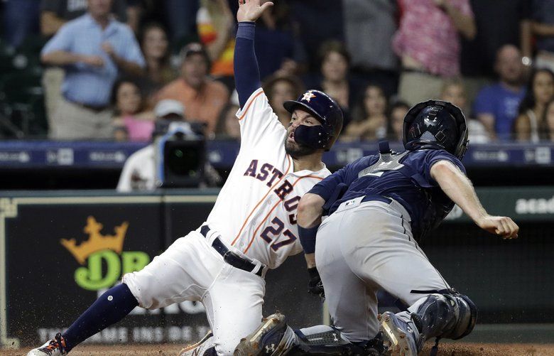 Seattle Mariners play their first game, a 7-0 loss to the