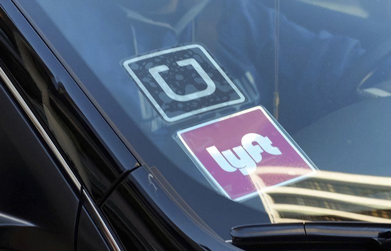 Seattle is considering a plan to set minimum pay for Uber and Lyft ...
