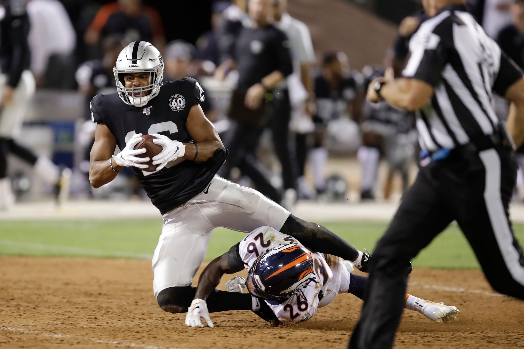 Photos: Last Oakland Raiders game played on dirt