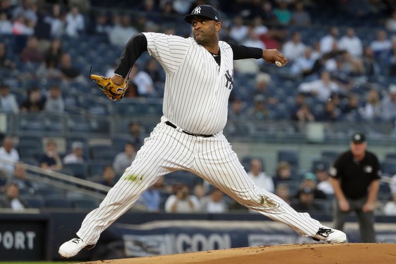 New York Yankees starting pitcher CC Sabathia delivers in the