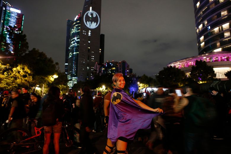 Holy anniversary! Displays of bat signal fete Batman at 80 | The Seattle  Times