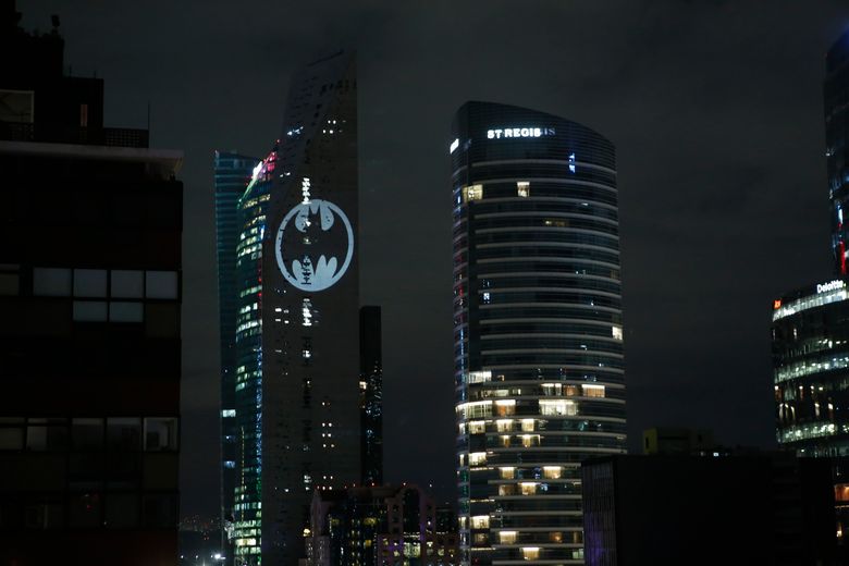 Holy anniversary! Displays of bat signal fete Batman at 80 | The Seattle  Times