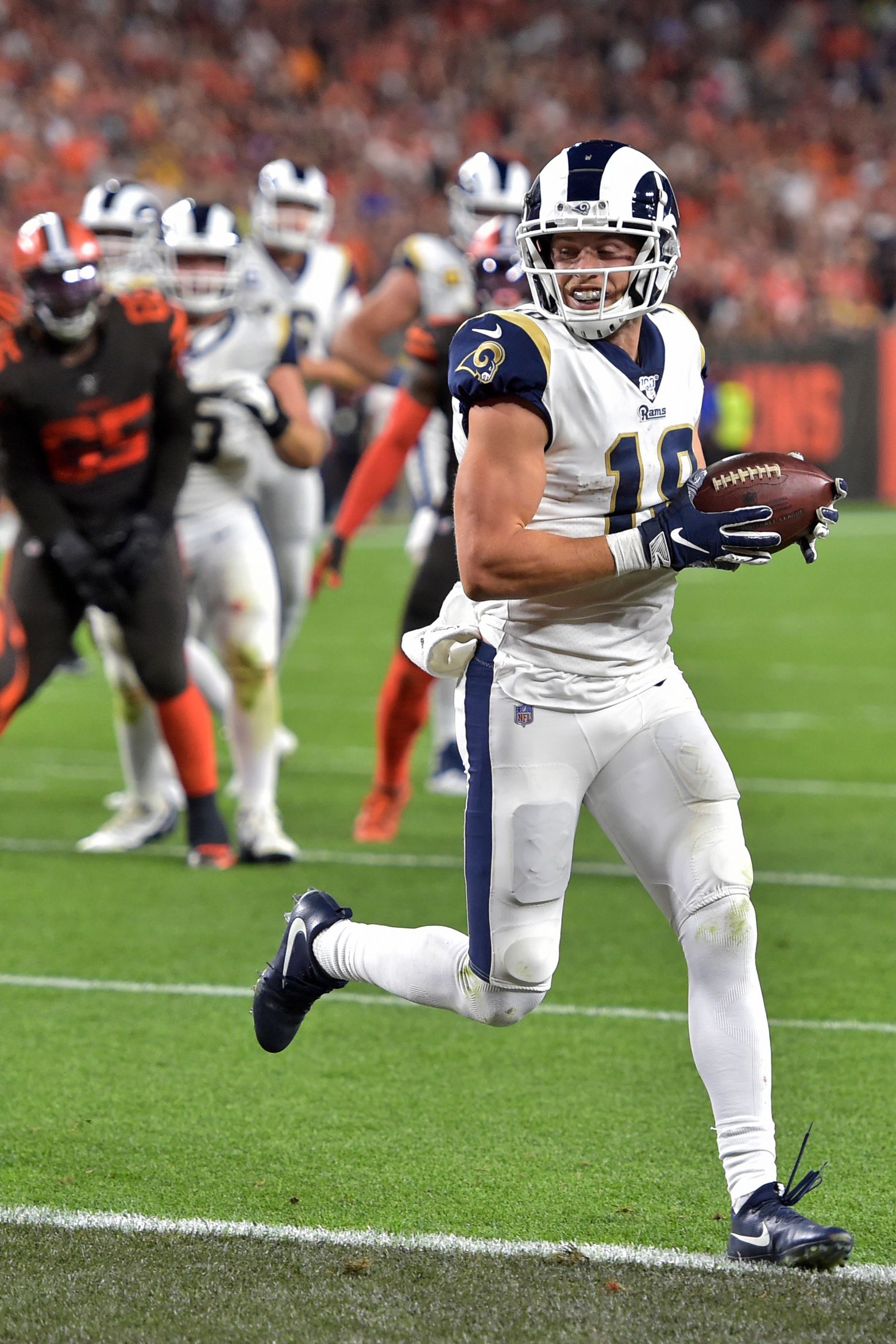 Rams stop Mayfield late, Goff throws 2 TDs passes in win