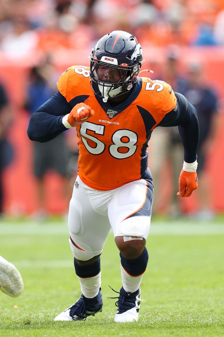 Denver Broncos linebacker Von Miller (58) rushes the line of