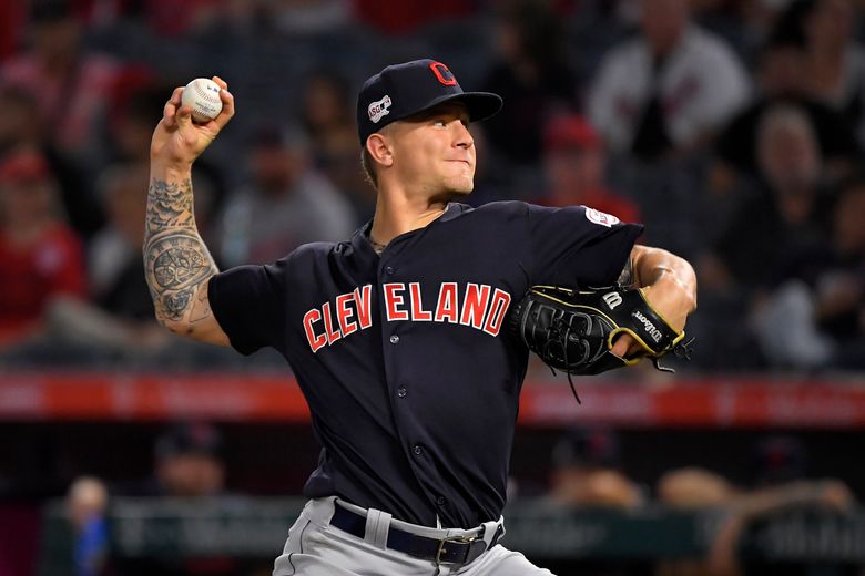 Cleveland Indians' Tyler Naquin, Corey Kluber, Terry Francona up