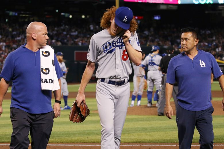 Dodgers pitcher Dustin May passes concussion test after taking