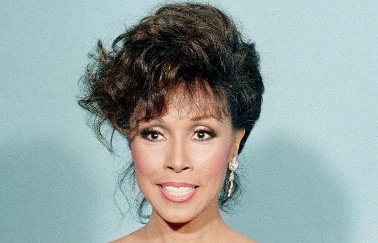 FILE – This Sept. 20, 1987 file photo shows actress Diahann Carroll at the Emmy Awards in Los Angeles. Carroll passed away Friday, Oct. 4, 2019  at her home in Los Angeles after a long bout with cancer.  She was 84. (AP Photo/Douglas Pizac, File) NYET504 NYET504