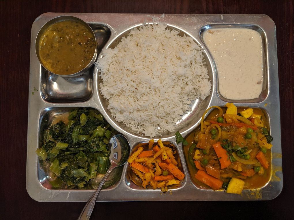 The daal bhaat at The Everest Kitchen is a complete (and filling) meal with lentil soup, pickles, curry, rice and even rice pudding for dessert. (Jackie Varriano / The Seattle Times)