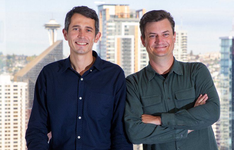 Convoy co-founders CEO Dan Lewis, left, and CTO Grant Goodale at their high-rise office overlooking downtown Seattle. The former Amazon employees have started a trucking business. 

Photographed on October 1, 2019.

 211658