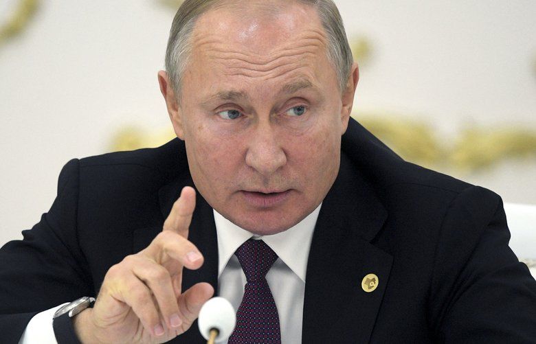 Russian President Vladimir Putin gestures while speaking at the Summit of leaders from the Commonwealth of Independent States (CIS) in Ashgabat, Turkmenistan, Friday, Oct. 11, 2019. Putin says he is worried that the Turkish invasion in Syria could pose a threat of a terrorist revival in the region. (Alexei Druzhinin, Sputnik, Kremlin Pool Photo via AP) XAZ109 XAZ109