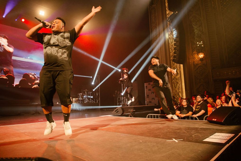 Alumni of The Residency program Wav Length (from left, Julio Villa, Jesus McCloskey aka GRXTTY and Kevin Campos aka Rain) perform at the Paramount Theatre. (Haley Blavka)