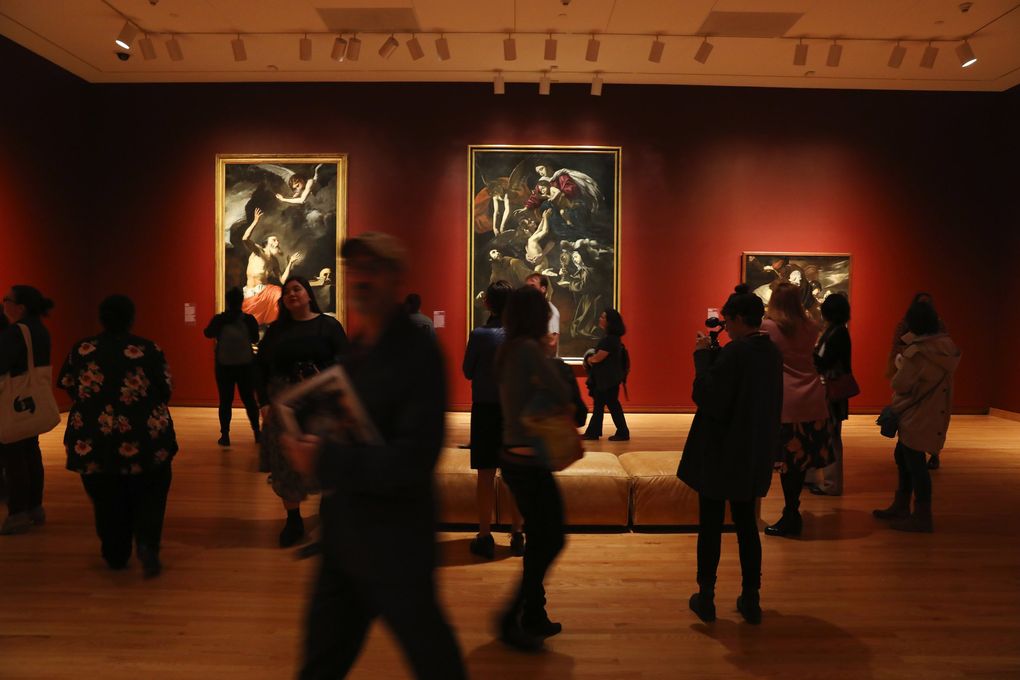 SAM visitors view artworks in the “Flesh and Blood: Italian Masterpieces from the Capodimonte Museum” exhibit. The collection is open through Jan. 26, 2020. (Ken Lambert / The Seattle Times)