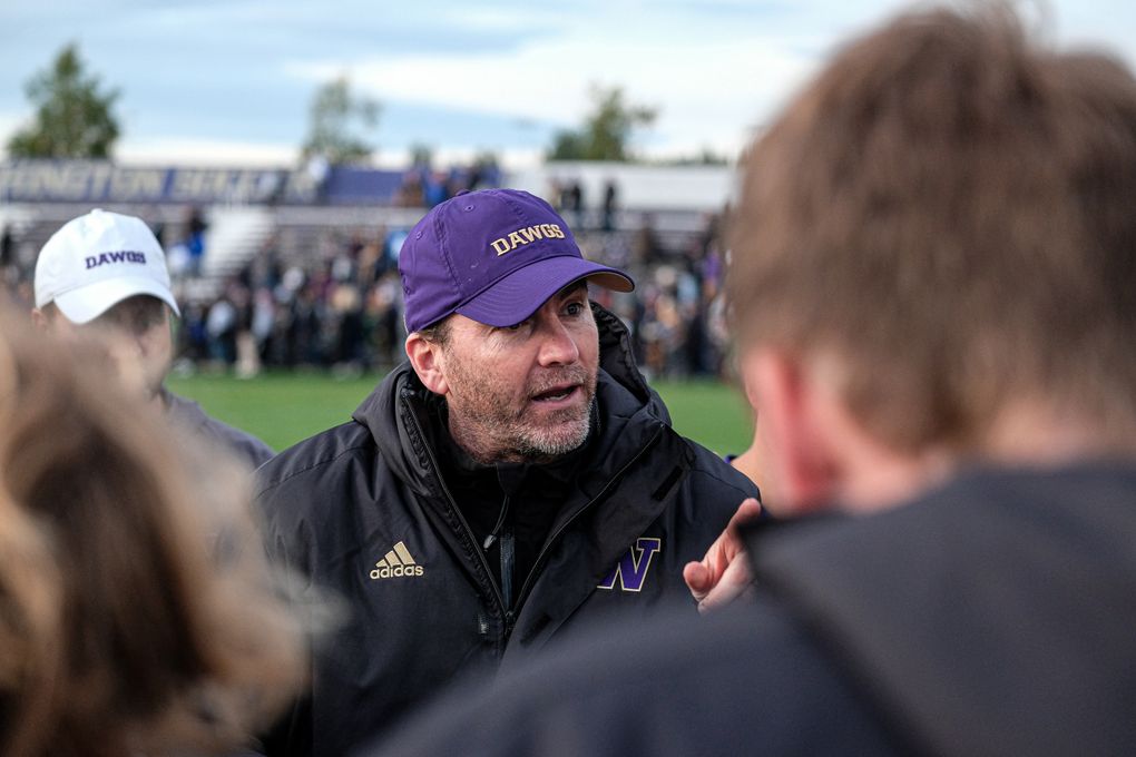 Washington soccer coach Jamie Clark talks to his team during a game this season.(Scott Eklund / Red Box Pictures)