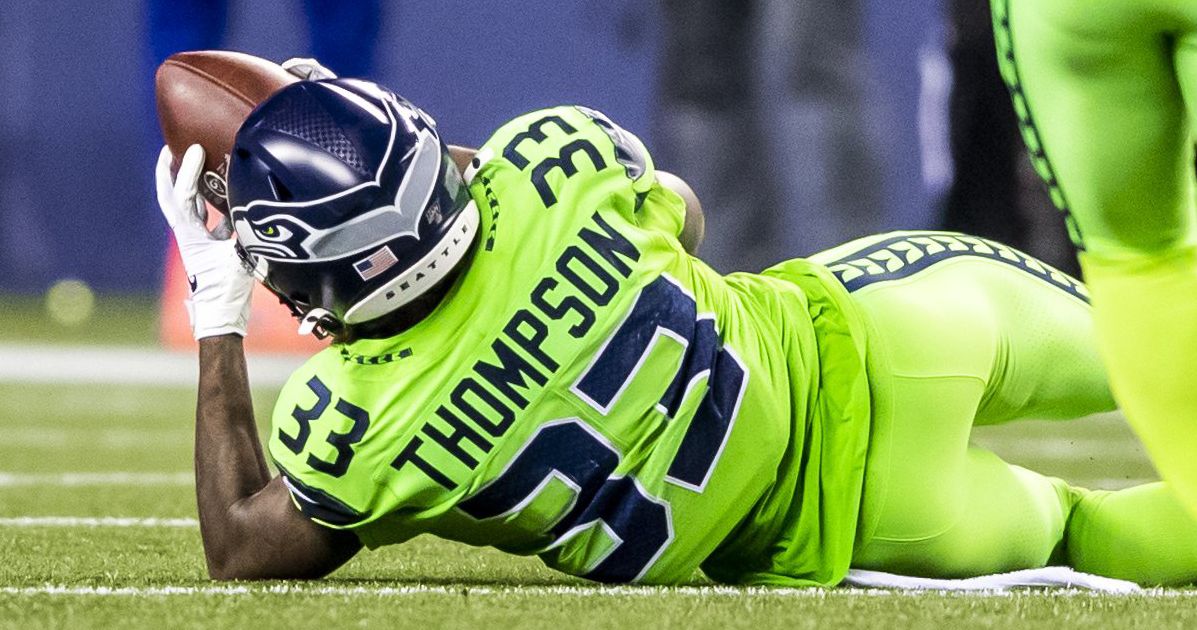 Seattle Seahawks free safety Tedric Thompson intercepts a pass intended for  Los Angeles Rams tight end Gerald Everett (not shown) during the second  half of an NFL football game, Thursday, Oct. 3