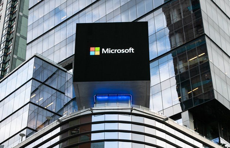FILE — A Microsoft sign in Times Square, in New York, Oct. 2, 2019. Microsoft was awarded the Defense Department’s 10-year JEDI cloud computing project over Amazon, whose founder, Jeff Bezos, has been a target of President Donald Trump’s criticism. (Jeenah Moon/The New York Times) XNYT180 XNYT180