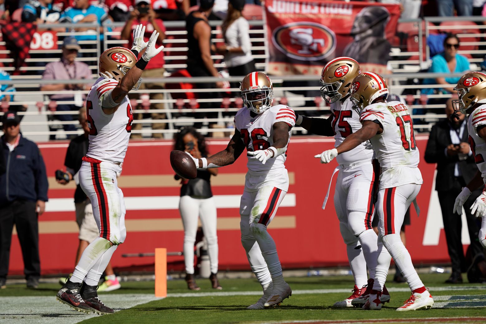 San Francisco 49ers wide receiver Jerry Rice takes off with a 51