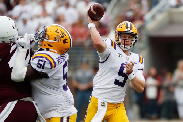 LSU quarterback Joe Burrow (9) throws the ball during an NCAA