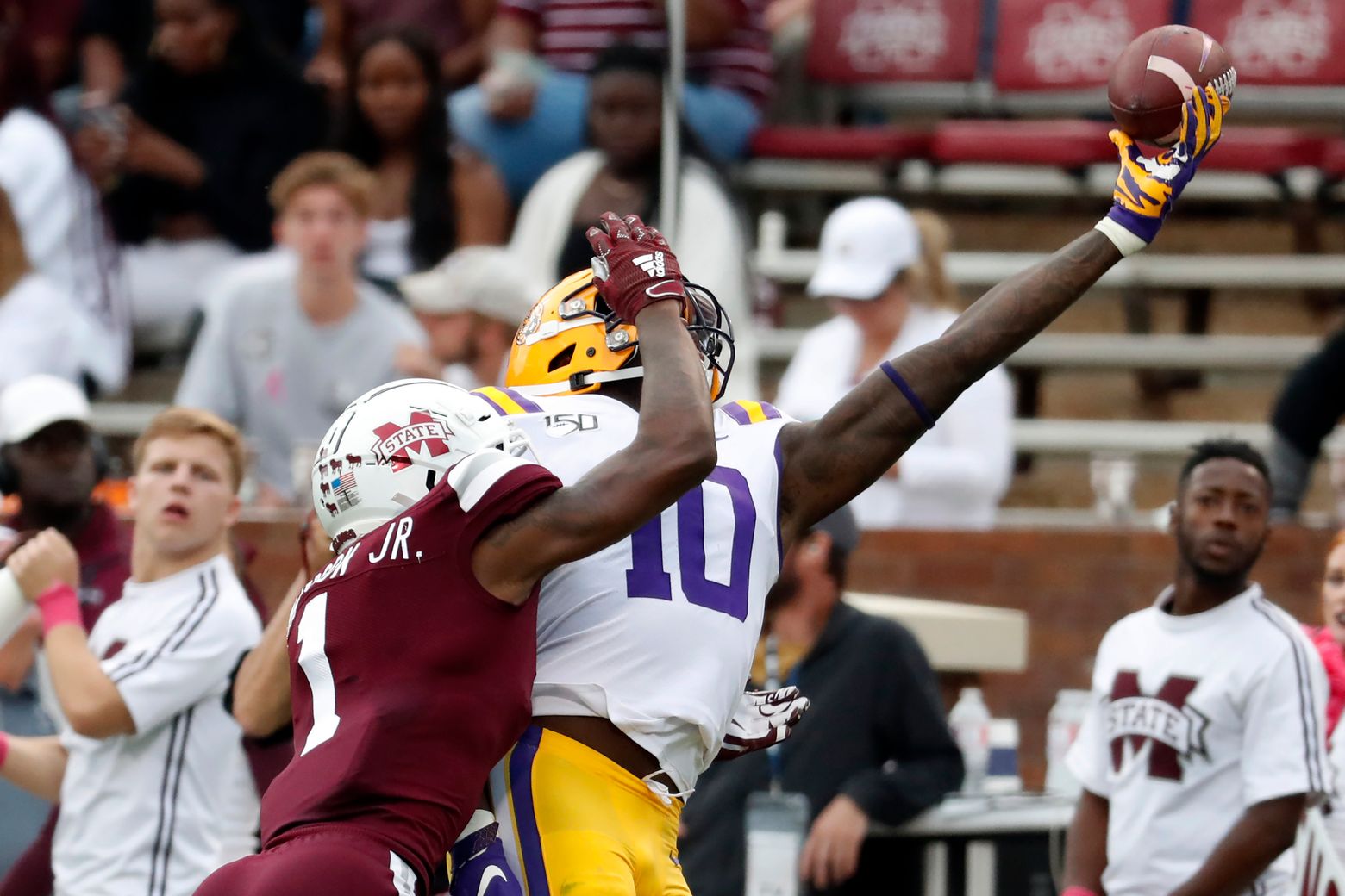 Mississippi State linebacker Willie Gay Jr. talks with Texans