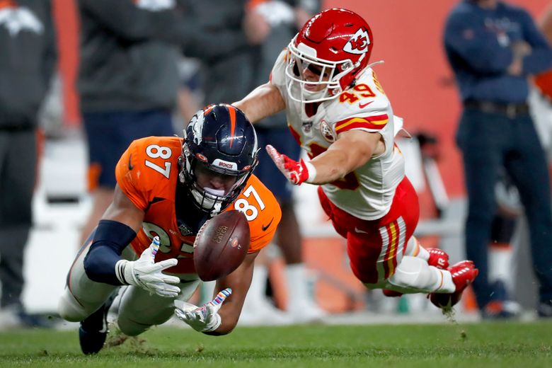 Denver Broncos quarterback Joe Flacco passes during warmups before